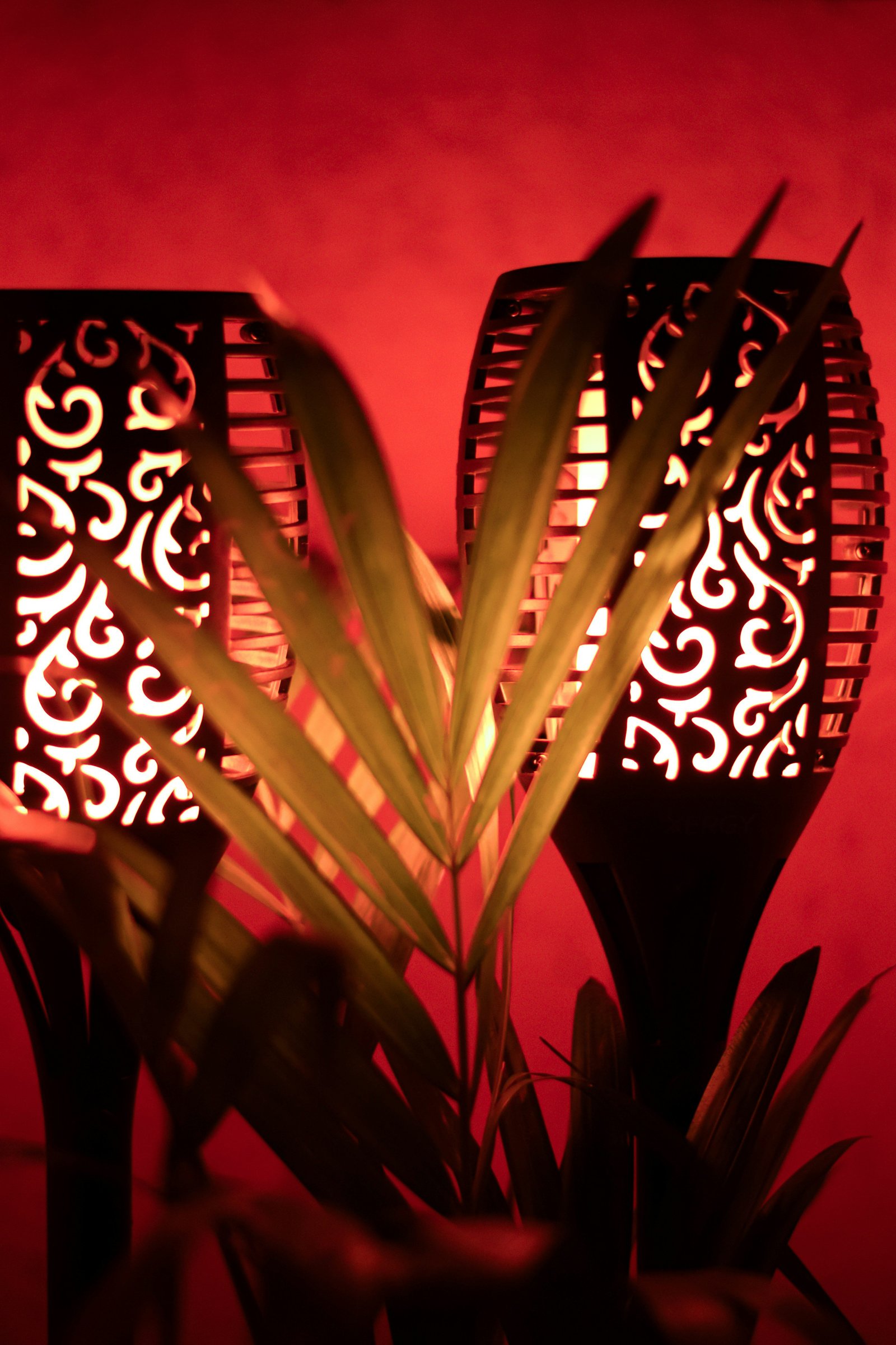 a couple of lamps sitting on top of a table